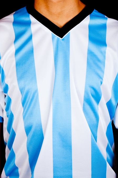 Man wearing an Argentinean shirt with stripes