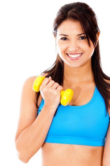 Fit woman lifting weights - isolated over a white background