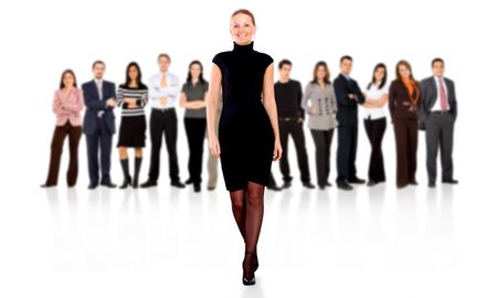 business woman walking and leading the team in front of the group isolated over a white background