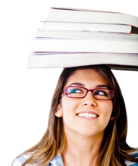 Geeky female student with books on her head - isolated over white
