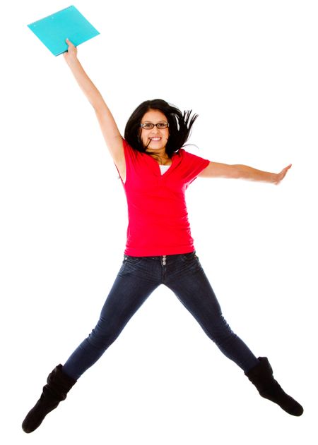 Excited female student jumping - isolated over a white background
