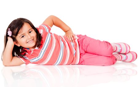 Cute girl lying on the floor - isolated over a white background