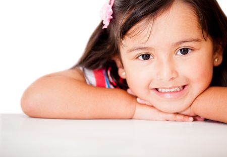 Sweet little girl smiling - isolated over a white background