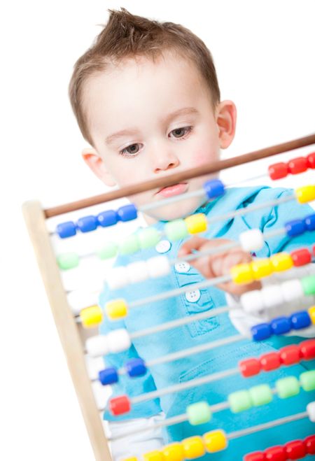 Boy playing with an abacus - isolated over a white background