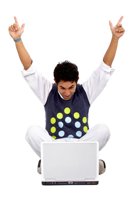 man having success on the internet in front of a laptop computer isolated over a white background