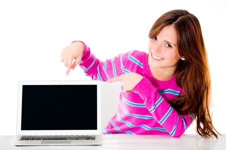 Woman pointing a computer screen - isolated over white background