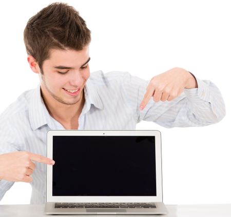 Man with a computer pointing the screen - isolated over white