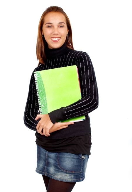 university student smiling and holding notebooks - isolated over a white background