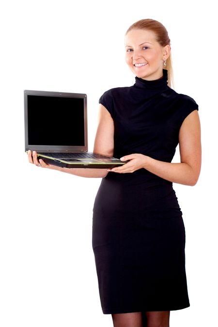Business woman displaying a laptop computer - isolated over a white background