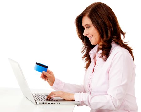 Woman shopping online on a laptop computer - isolated over white