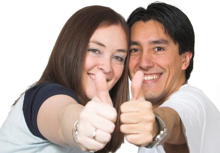 casual happy couple showing their thumbs up