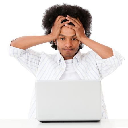 Worried black man on a laptop - isolated over a white background