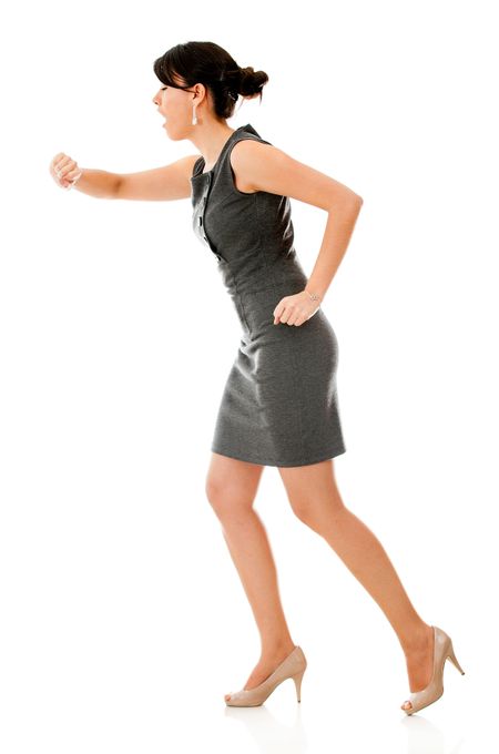 Business woman in a hurry - isolated over a white background