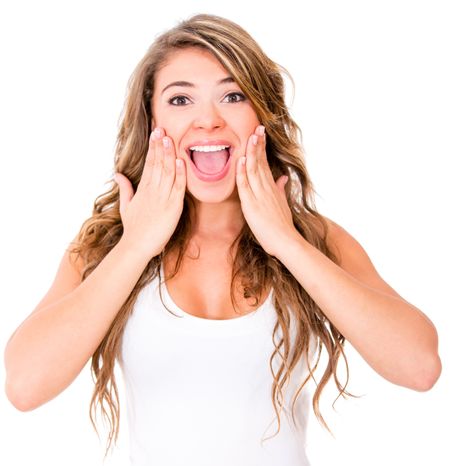 Excited woman looking very surprised - isolated over white