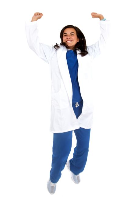 happy female doctor jumping and smiling from her success isolated over a white background