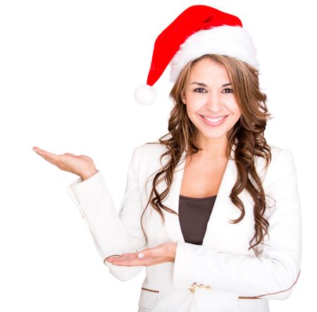 Businesswoman celebrating Christmas and displaying something