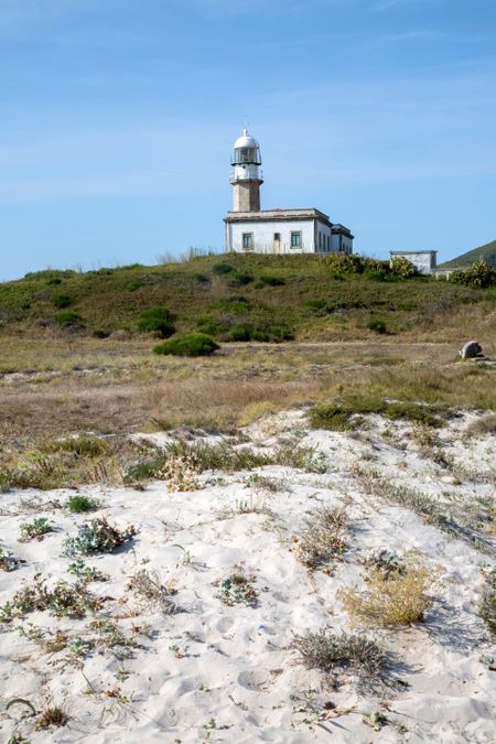 Beach and Lighthouse; Galicia; Spain