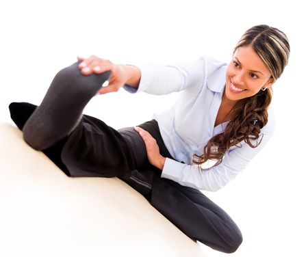 Business woman stretching during an active pause - isolated over white