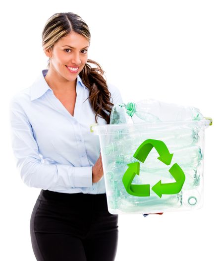 Happy woman recycling plastic bottles - isolated over a white background
