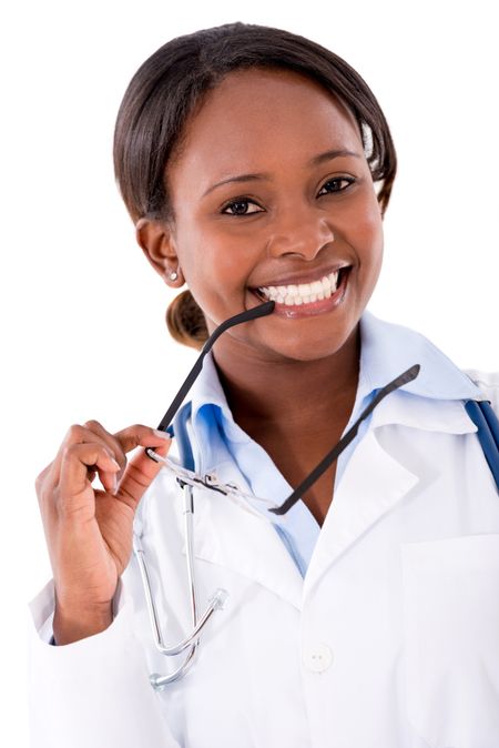 Friendly female doctor looking happy - isolated over white