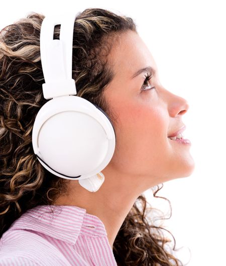 Happy woman listening to music - isolated over white background