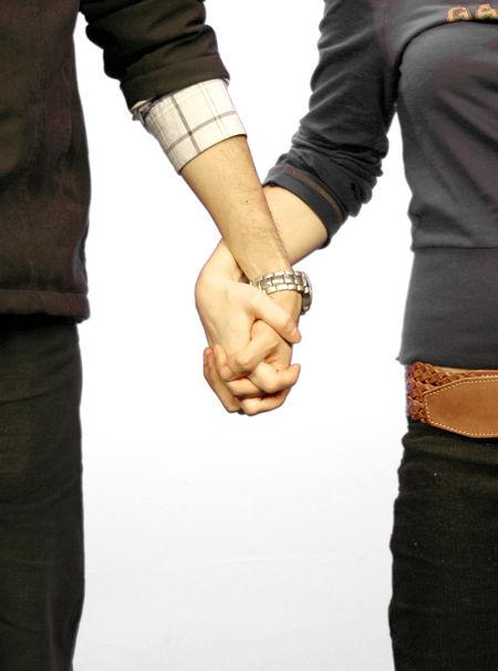 Casual couple holding hands