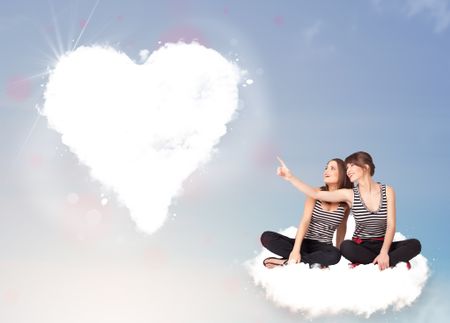 Beautiful young lovely women sitting on cloud with heart