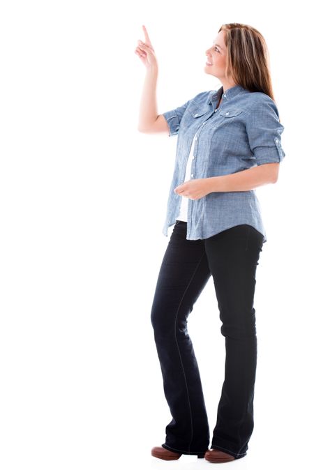 Casual woman pointing to the side - isolated over a white background