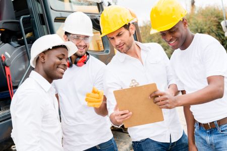 Group of men working on a construction site  