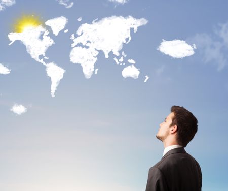 Businessman looking at world clouds and sun on blue sky