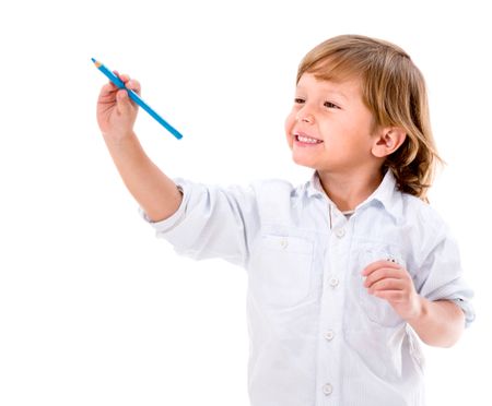 Happy boy coloring with a blue pencil - isolated over white background 