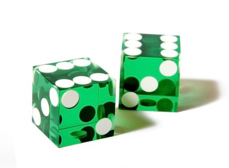 green dices on white background