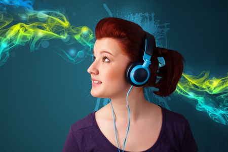 Pretty young woman with headphones listening to music, glowing smoke concept