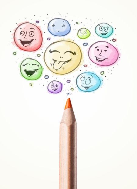 Coloured smiley face bubbles coming out of pencil