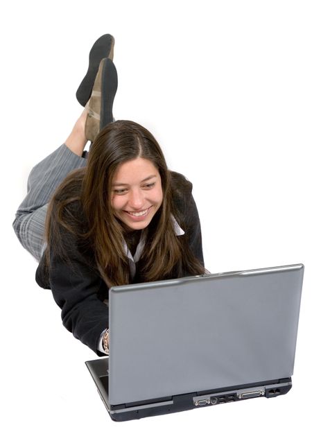 business woman on a laptop on the floor over white