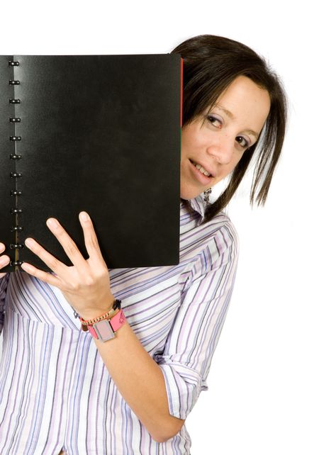 beautiful student with a notebook over a white background