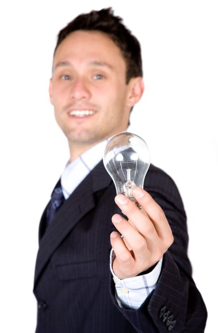 business man holding a lightbulb over white