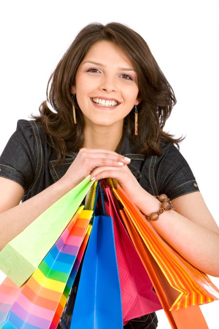 Casual woman shopping bags isolated over a white background