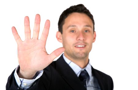 business man showing his hand over a white background (shallow DOF)