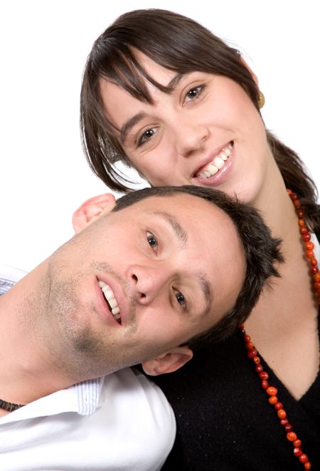 happy couple smiling over a white background