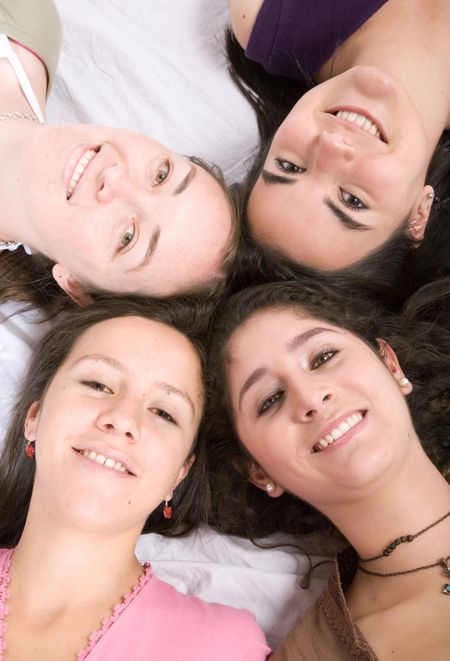girls on the floor over a white background