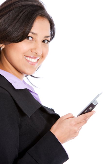 business woman smiling while dialling on the phone