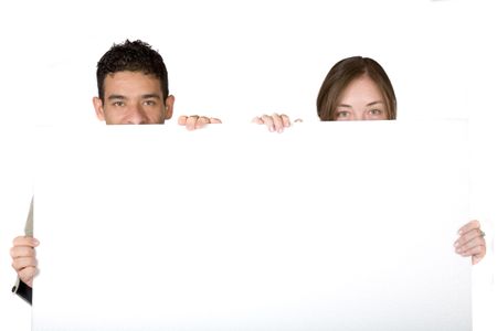 couple holding white banner over a white background
