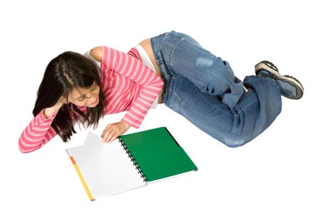 girl studying on the floor over white
