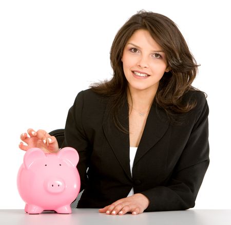business woman showing her savings in a piggy bank isolated