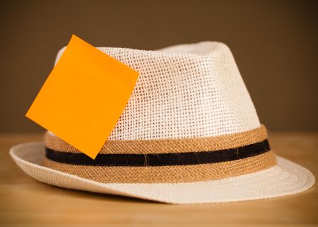 Hat with empty sticky note