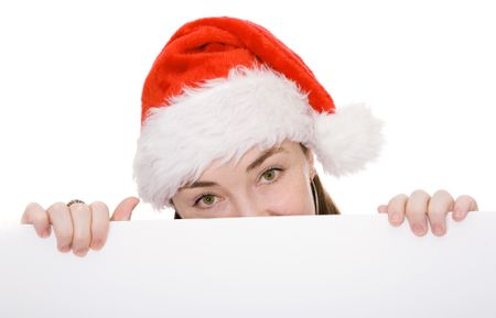 christmas woman peeping over a white card