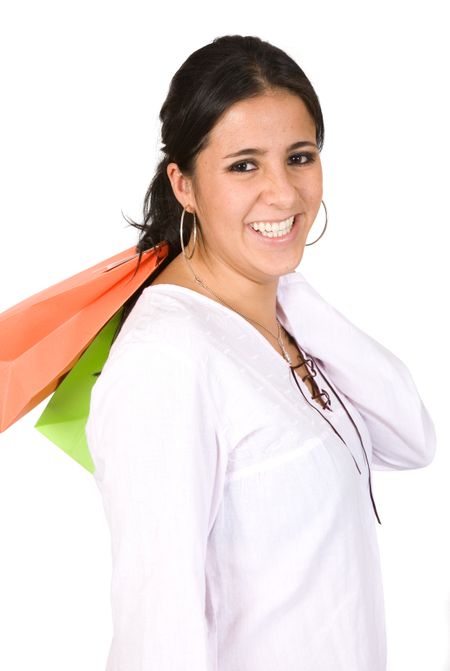girl with shopping bags over a white background with a big smile