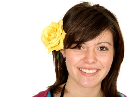 beautiful girl with a yellow rose on her head over a white background