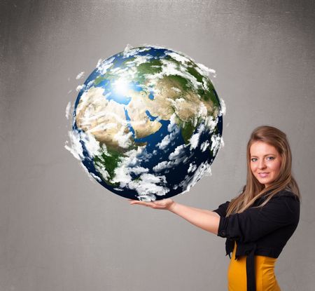 Pretty young girl holding 3d planet earth
